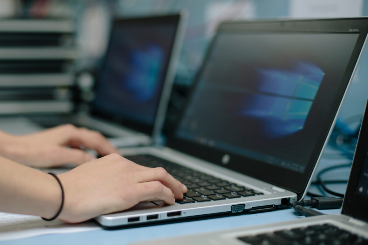 Young person working on a laptop