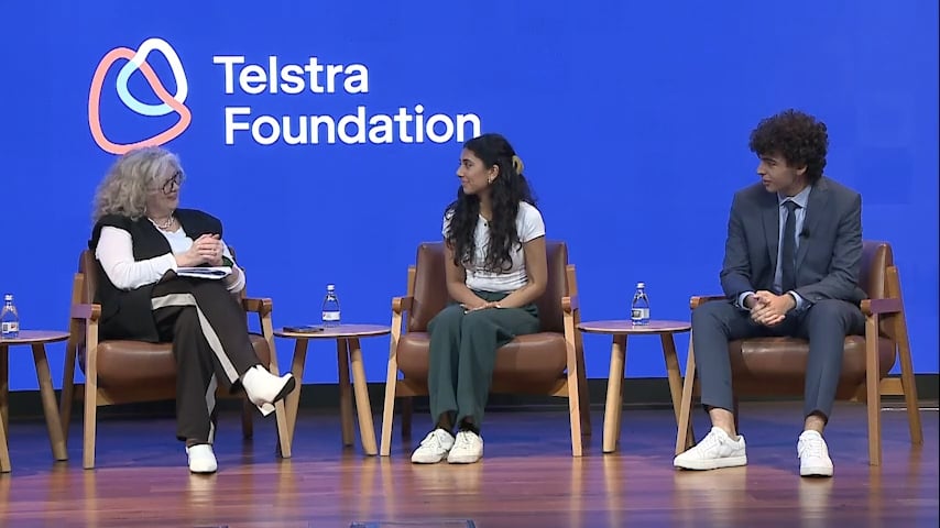 Jackie Coates, Sucheta and Alex seated on stage talking about the index